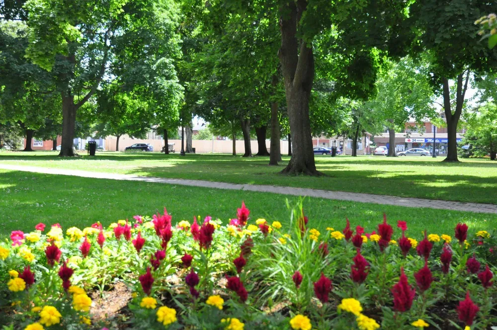 Flower beds and walking paths in Alexandra Park, Brantford